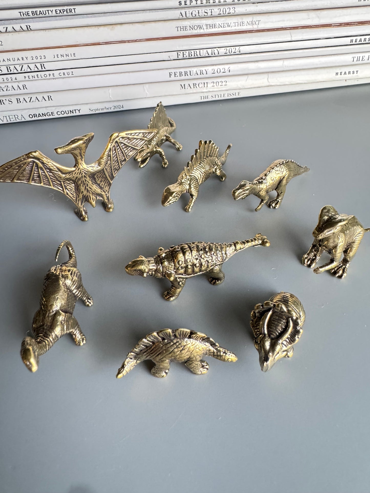 Set of 9 Dinosaur Figurines – Brass Tone Mini Prehistoric Animals – Decorative Collectible Shelf Decor