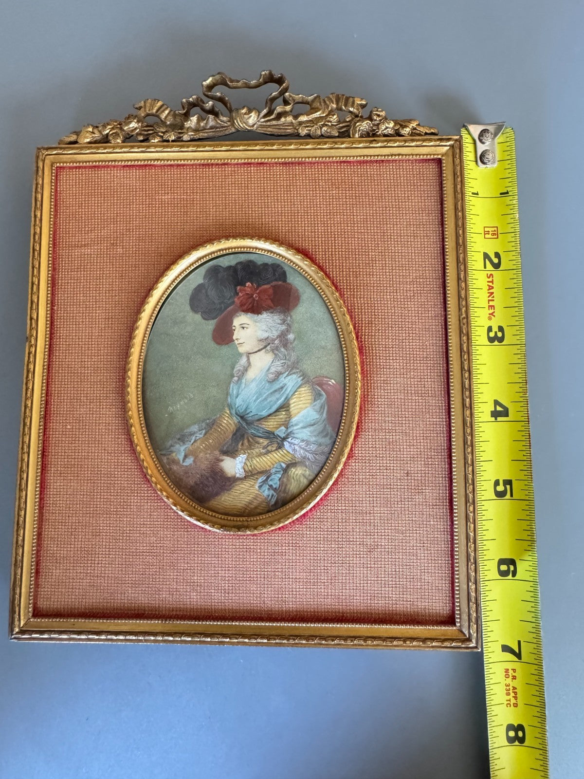 Antiquity 18th-century portrait miniature. Signed “Reynolds”