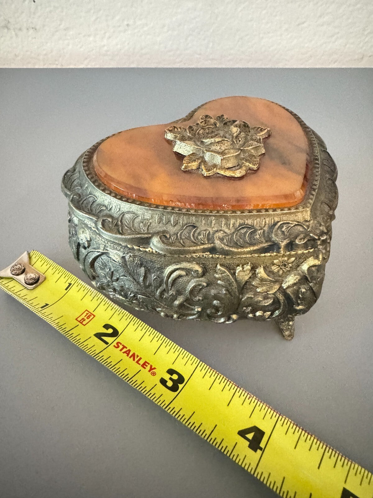 Vintage Heart-Shaped Musical Jewelry Box – Ornate Floral Metal with Amber-Look