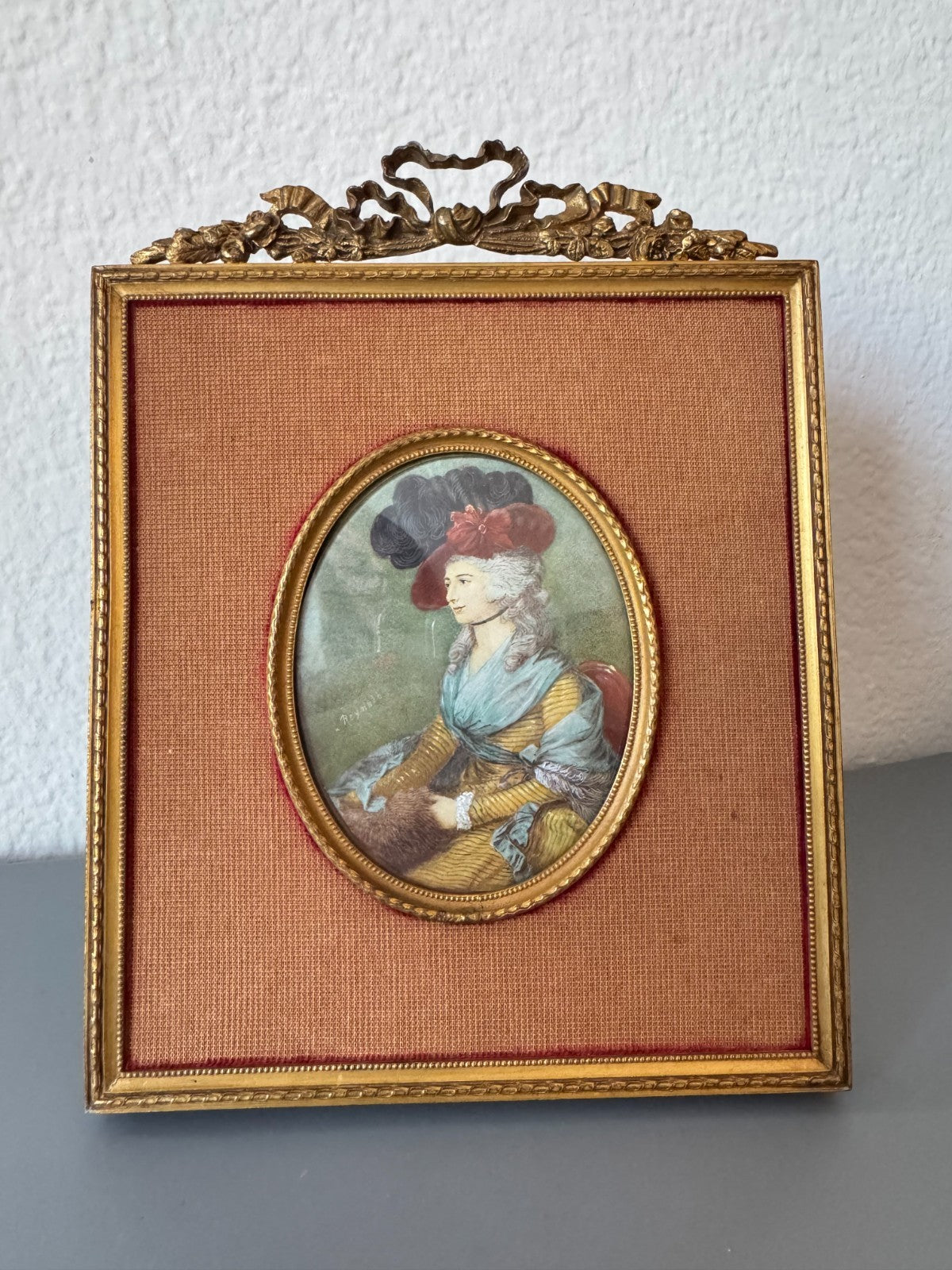 Antiquity 18th-century portrait miniature. Signed “Reynolds”