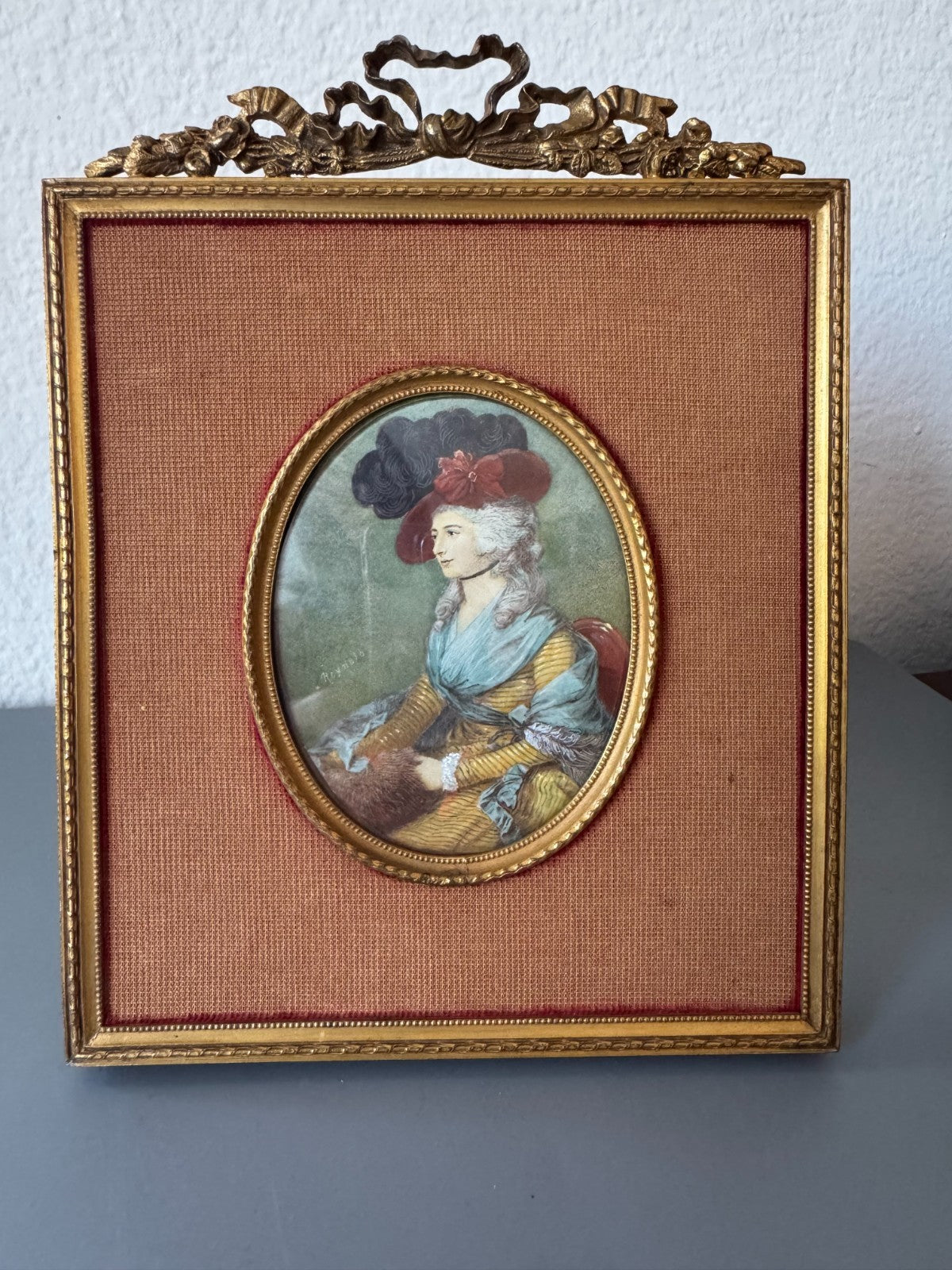 Antiquity 18th-century portrait miniature. Signed “Reynolds”