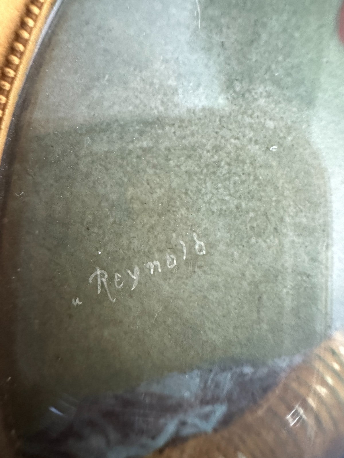 Antiquity 18th-century portrait miniature. Signed “Reynolds”