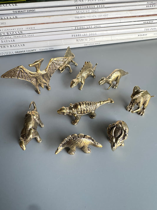 Set of 9 Dinosaur Figurines – Brass Tone Mini Prehistoric Animals – Decorative Collectible Shelf Decor