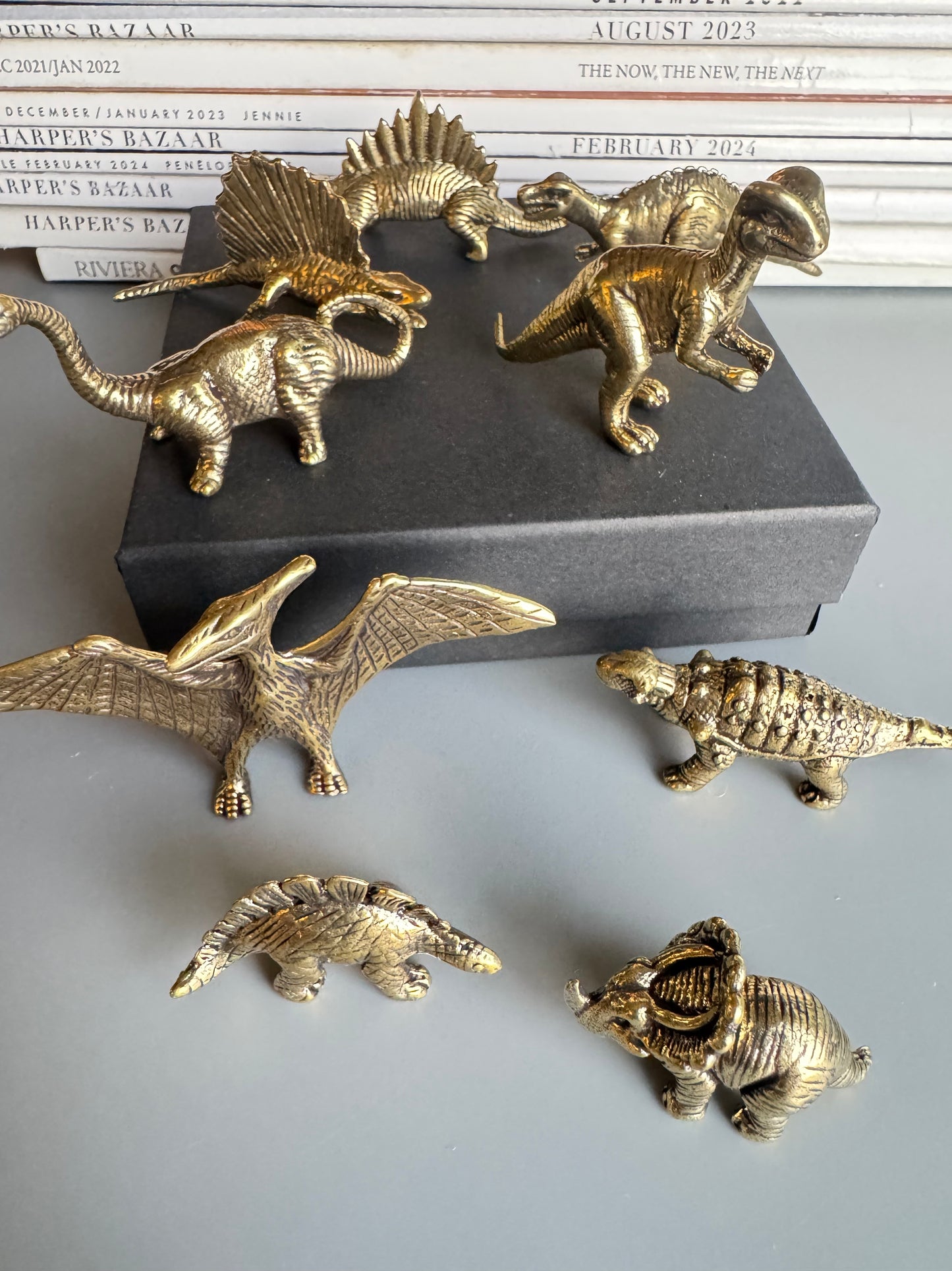 Set of 9 Dinosaur Figurines – Brass Tone Mini Prehistoric Animals – Decorative Collectible Shelf Decor