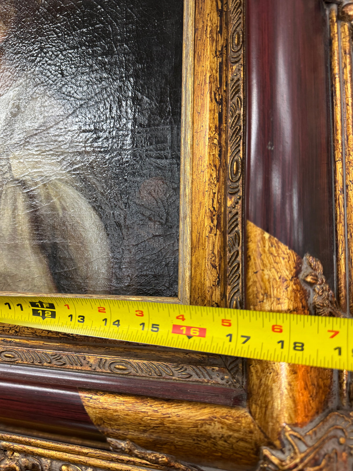 Tape measure showing the canvas width of about 16 inches