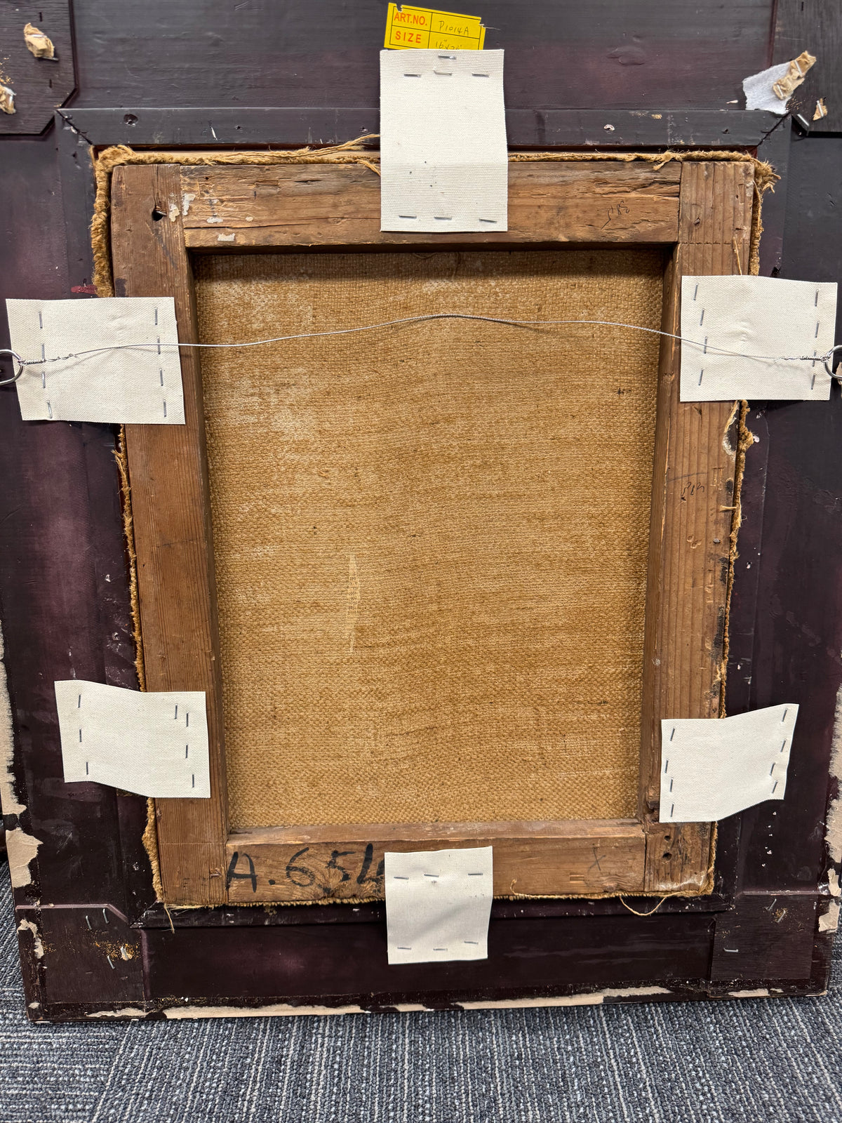 Back of the painting: old relined canvas, antique strainer and inventory number A.654