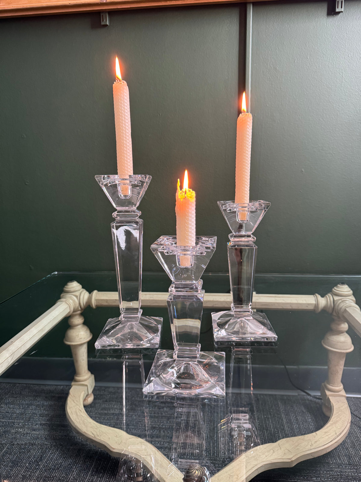Shannon Crystal candle holders with lit taper candles, graduated heights
