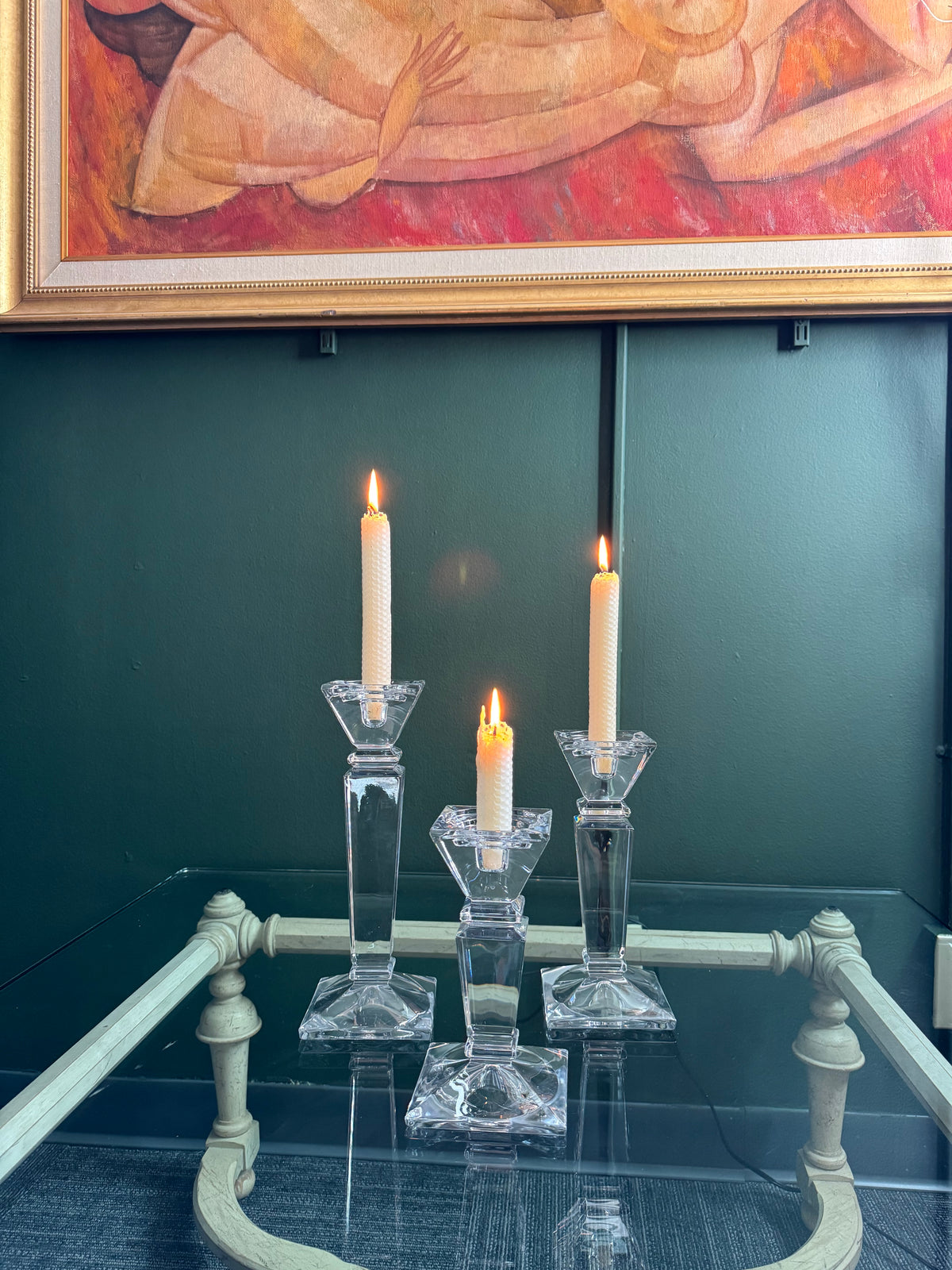 Clear crystal candlestick trio with square cups and stepped bases